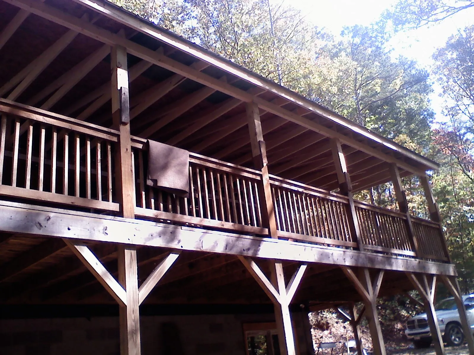 Timber framing under a new elevated porch and deck — Roof Leak Repair in Oakfield by Roofing Brothers